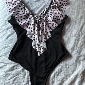 Sporlike women’s black one piece V-neck ruffle swim suit